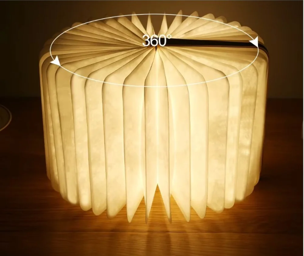 Лампа-книжка, розкрита на 360°, світить як круглий ліхтар